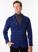 Knitted blue men's jacket in a white cage