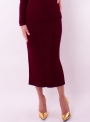 Woman's knitted roll-neck and skirt set