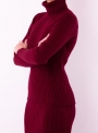 Woman's knitted roll-neck and skirt set
