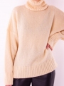 Женский бежевый свитер крупной вязки