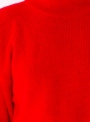 Жіночий яскраво червоний светр грубої в'язки