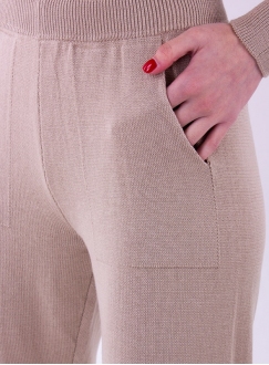 Женские вязаные брюки бежевого цвета
